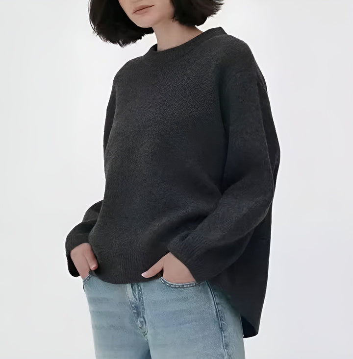 "Trendy oversized sweater in zachtroze met losse pasvorm, ideaal voor herfst en winter, perfect voor jeans en leggings."
