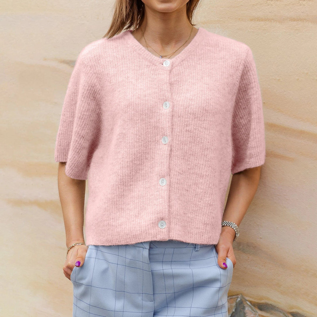 "Trendy streetwear vest met korte mouwen, ronde hals, zacht geel/grijs/roze/zout, perfect voor casual of formele looks."