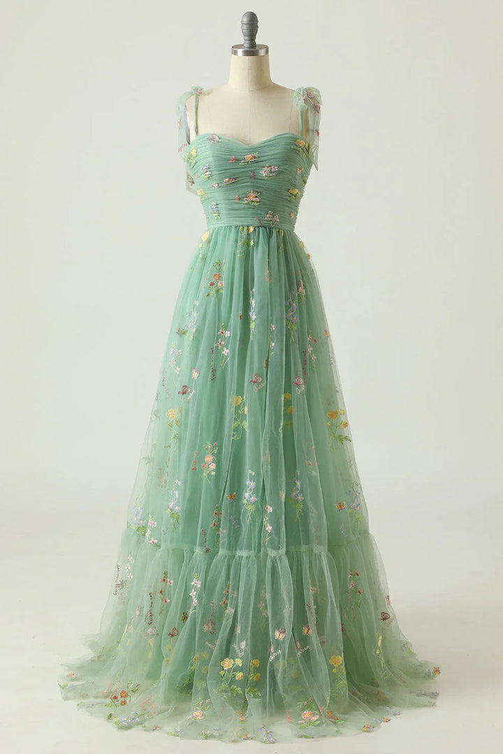 "Tule baljurk met bloemenborduursel, elegant en luxueus, verkrijgbaar in groen en blauw, voor speciale gelegenheden."
