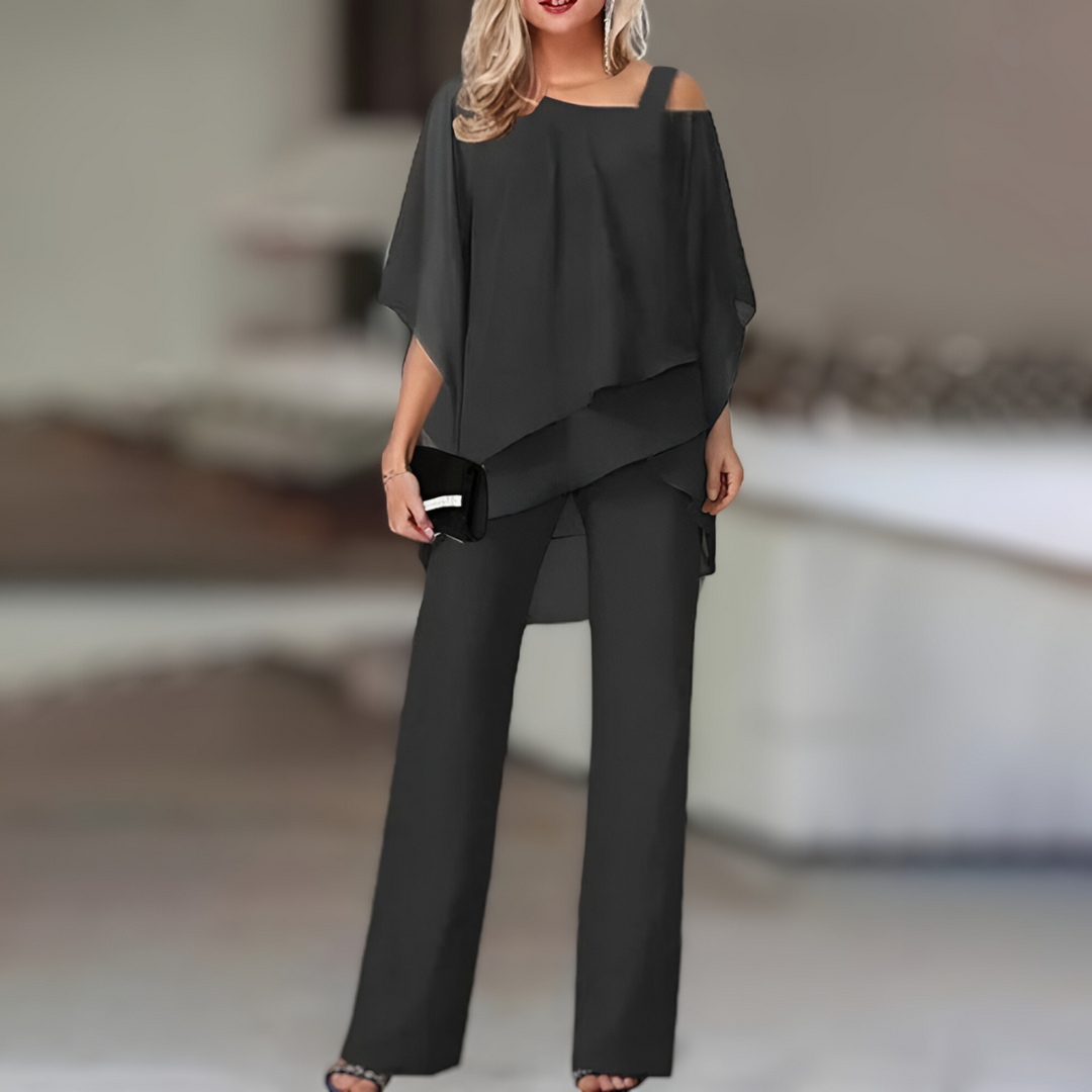 "Tweedelige dames set: elegante top en broek met verfijnde stijl, comfortabel en veelzijdig voor elke gelegenheid."