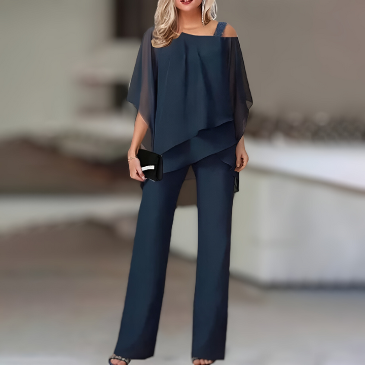 "Tweedelige dames set: elegante top en broek met verfijnde stijl, comfortabel en veelzijdig voor elke gelegenheid."