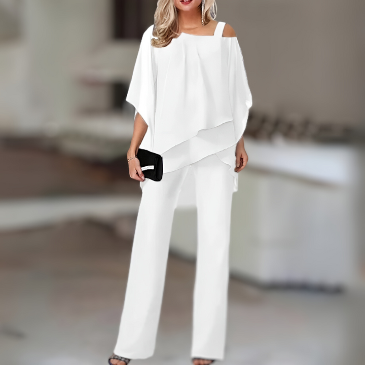 "Tweedelige dames set: elegante top en broek met verfijnde stijl, comfortabel en veelzijdig voor elke gelegenheid."
