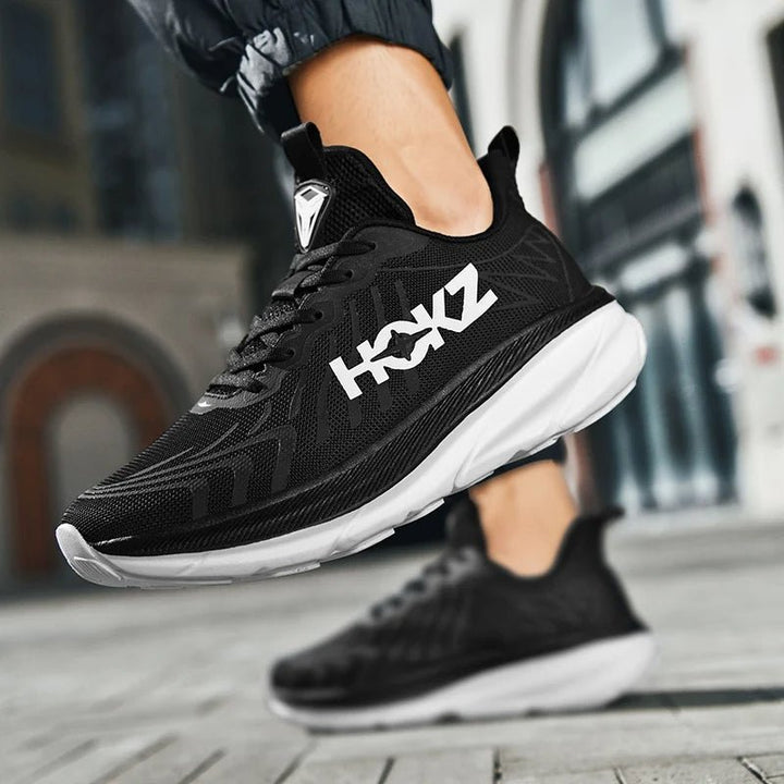 "Ultralichte unisex sportschoenen met futuristisch ontwerp en verhoogde zool voor hardlopen en fitness in diverse kleuren."