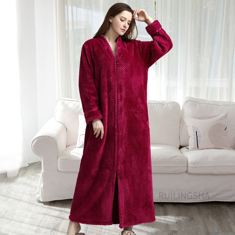 "Unisex thermo badjas met rits, lange mouwen en zakken, warm en comfortabel, ideaal voor koude dagen thuis."