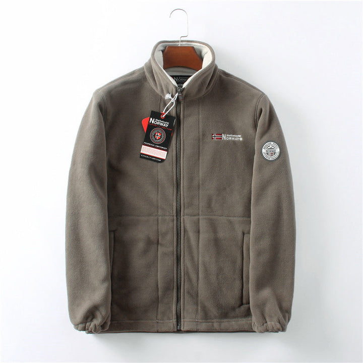 "Unisex ultra warme fleece jas in zacht materiaal voor heren en dames, perfect voor koude winterdagen met praktische zakken."