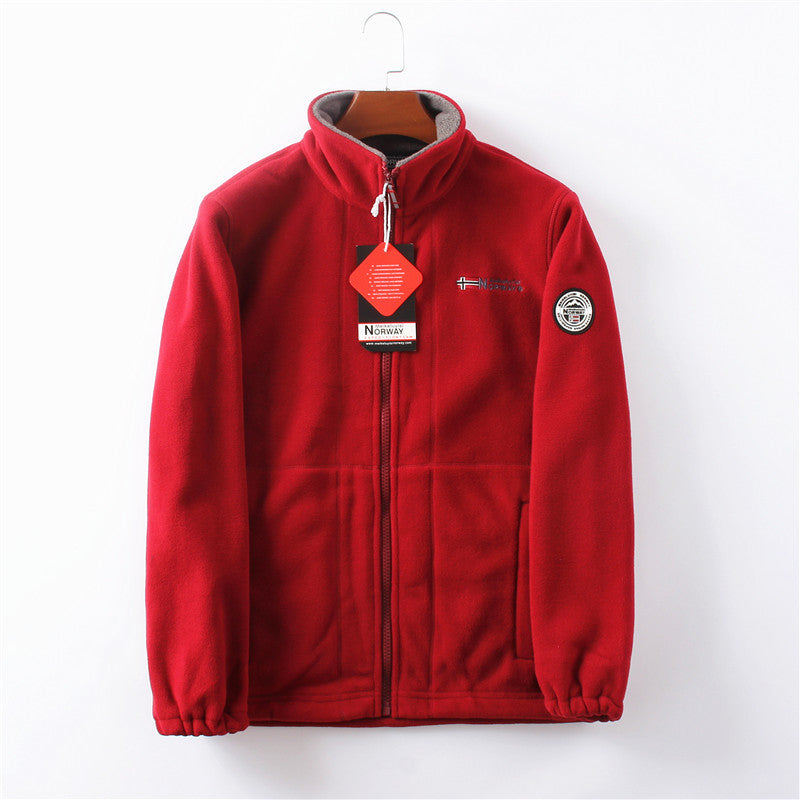 "Unisex ultra warme fleece jas in zacht materiaal voor heren en dames, perfect voor koude winterdagen met praktische zakken."