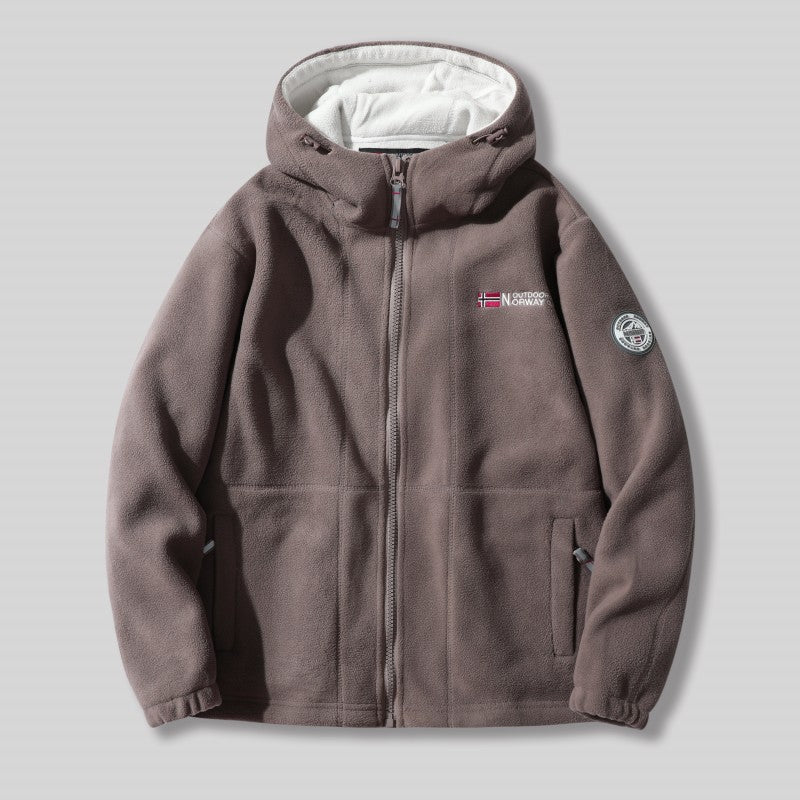 "Unisex ultra warme fleece jas in zacht materiaal voor heren en dames, perfect voor koude winterdagen met praktische zakken."
