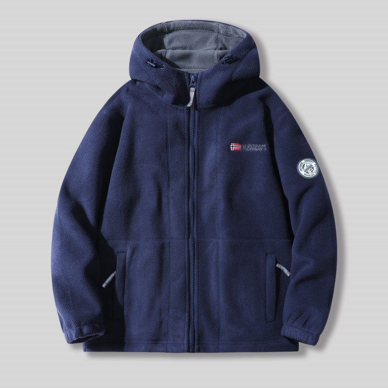 "Unisex ultra warme fleece jas in zacht materiaal voor heren en dames, perfect voor koude winterdagen met praktische zakken."