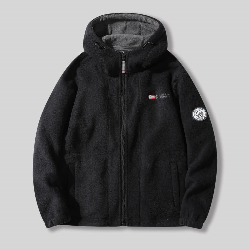 "Unisex ultra warme fleece jas in zacht materiaal voor heren en dames, perfect voor koude winterdagen met praktische zakken."