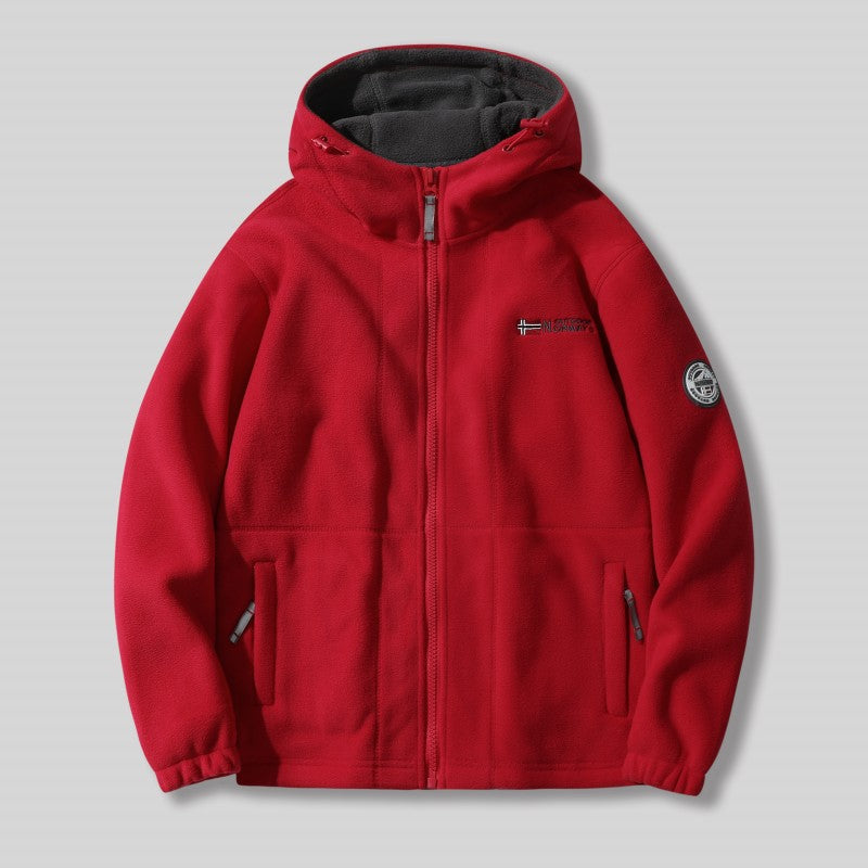 "Unisex ultra warme fleece jas in zacht materiaal voor heren en dames, perfect voor koude winterdagen met praktische zakken."