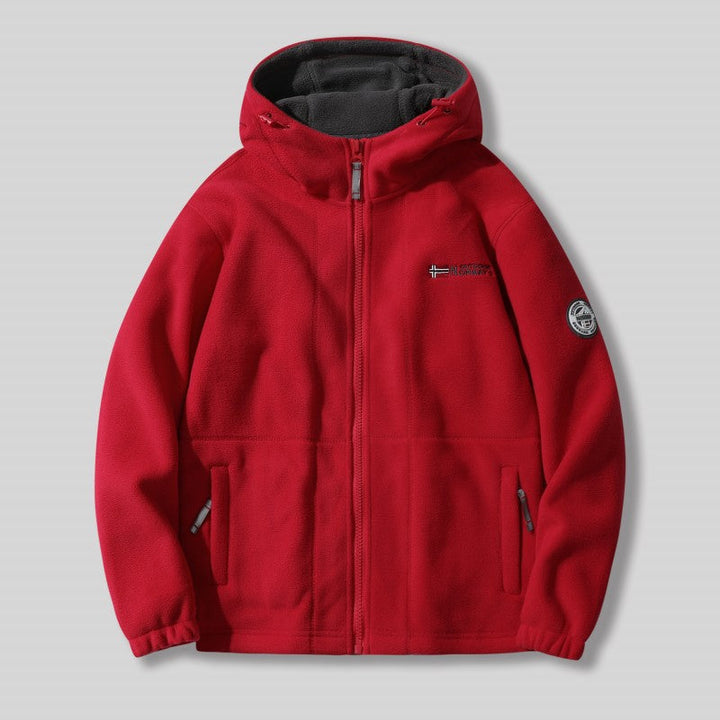 "Unisex ultra warme fleece jas in zacht materiaal voor heren en dames, perfect voor koude winterdagen met praktische zakken."
