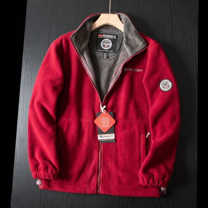 "Unisex ultra warme fleece jas in zacht materiaal voor heren en dames, perfect voor koude winterdagen met praktische zakken."