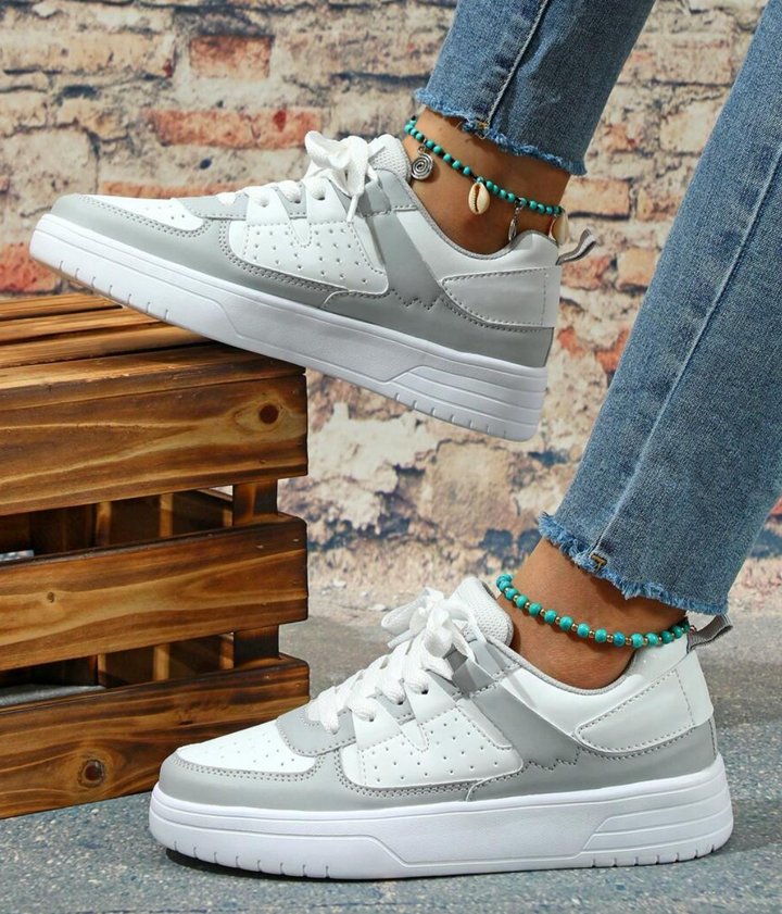 "Valeen sneakers voor dames, kleurrijk design met levendige pastelkleuren en ademend bovenwerk voor comfort en stijl."