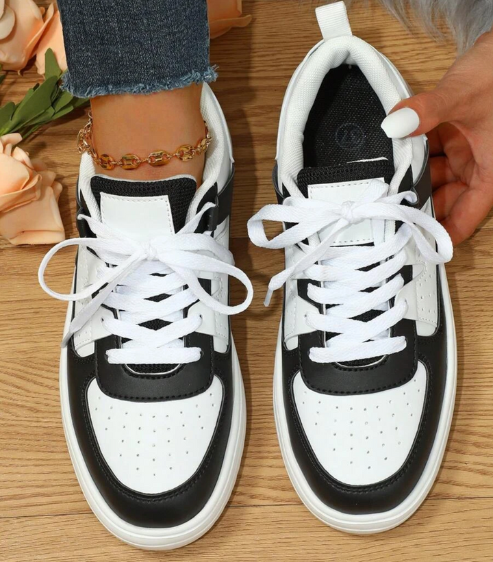 "Valeen sneakers voor dames, kleurrijk design met levendige pastelkleuren en ademend bovenwerk voor comfort en stijl."