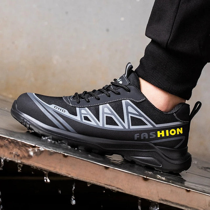 Veiligheidsschoenen S3 voor mannen, grijs en zwart, met brede veiligheidsneus, antislipzolen en stalen neus voor bescherming.