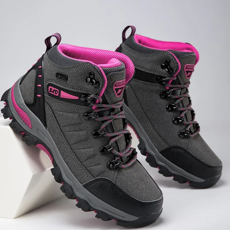 Veiligheidswerkschoenen voor dames, waterdicht en antislip, met versterkte enkelondersteuning en ronde teen, grijs.