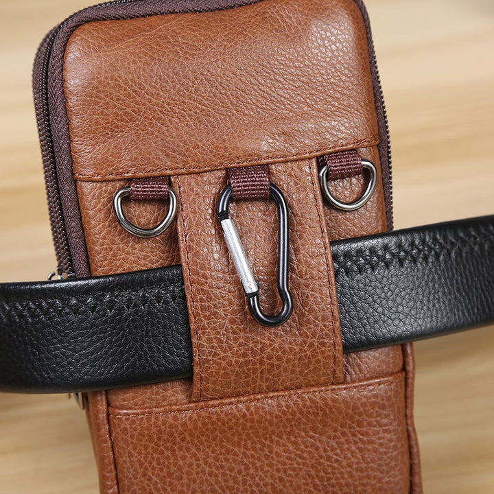 "Vintage leren heren crossbody heuptas met verstelbare band, stijlvolle bruine tas met ruime vakken en robuust ontwerp."