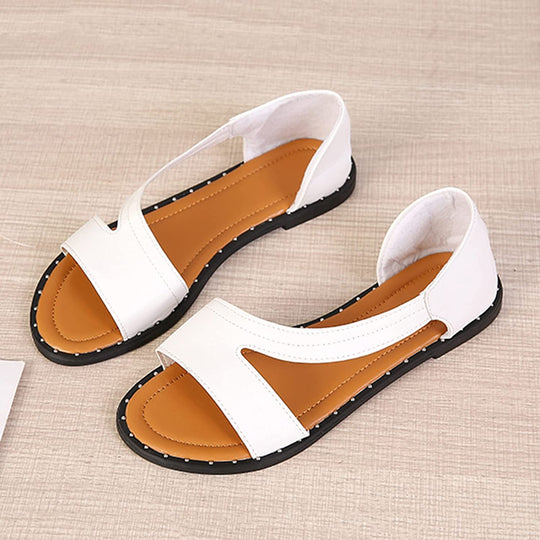 "Vrouwelijke Nikkie Premium sandalen met schokabsorberende zolen in elegant zwart, ideaal voor dagelijks comfort."
