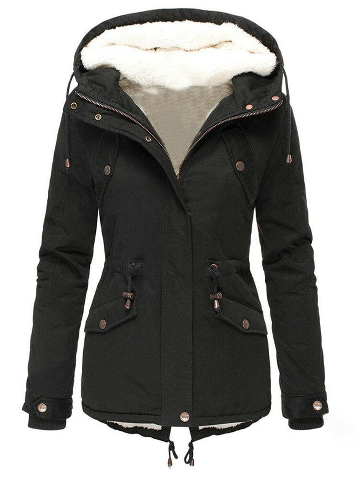 "Warm, waterafstotende winterjas voor vrouwen, stijlvol ontwerp, model draagt jas, ideaal voor koude dagen met regen."