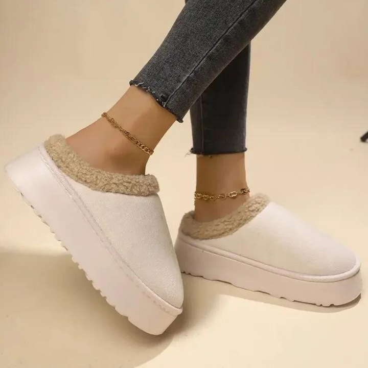 Warme damespantoffels met luxe voering in rijke kleuren, perfect voor koude dagen. Beschikbaar in maten 34-41.