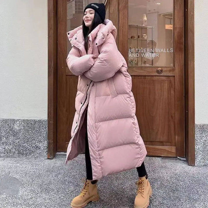 Warme lange donsjas voor dames met donsvoering, elegant ontwerp. Beschikbaar in zwart, roze, groen, en beige.