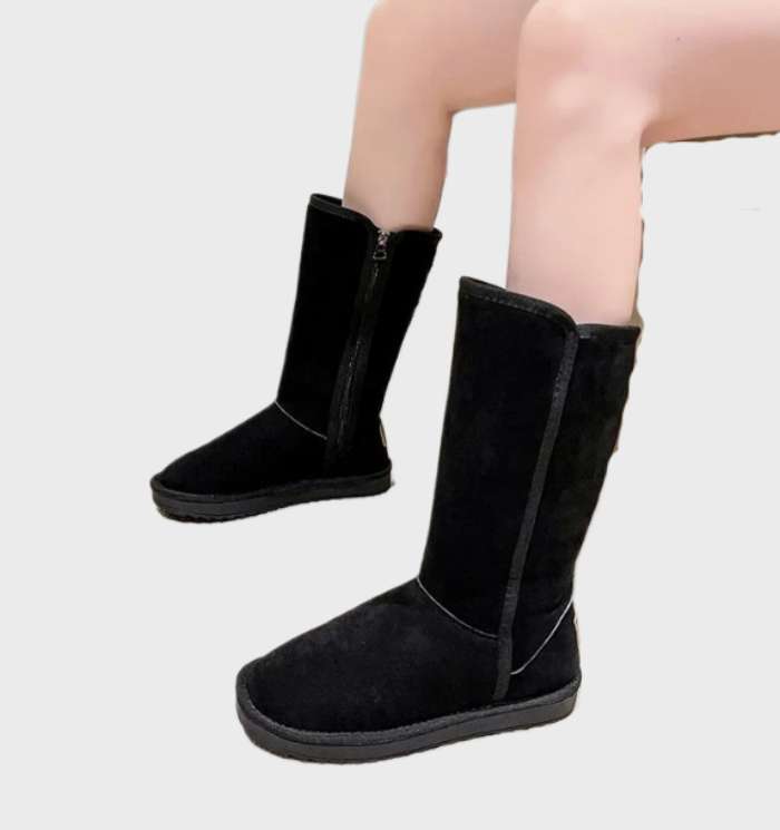 "Warme, waterdichte suède sheepskin laarzen met ritssluiting, ideaal voor herfst en winter."