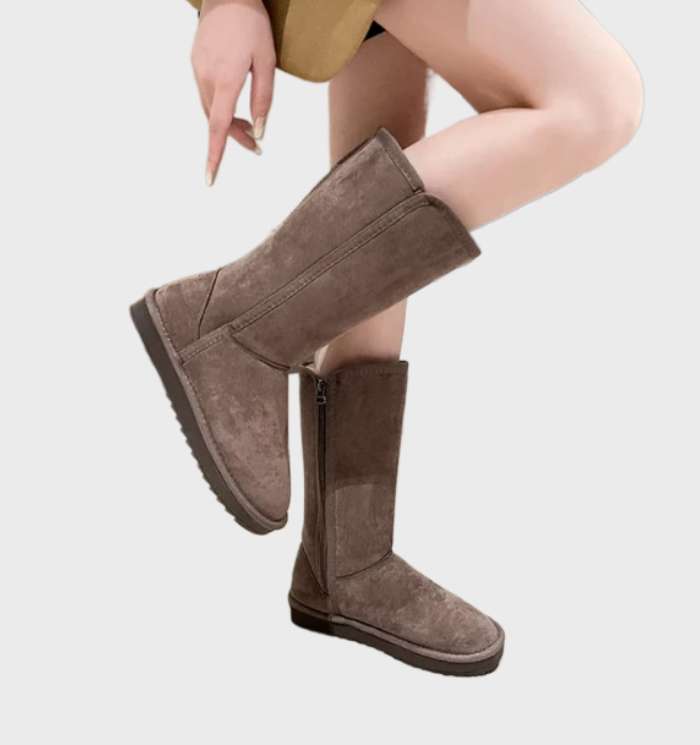 "Warme, waterdichte suède sheepskin laarzen met ritssluiting, ideaal voor herfst en winter."