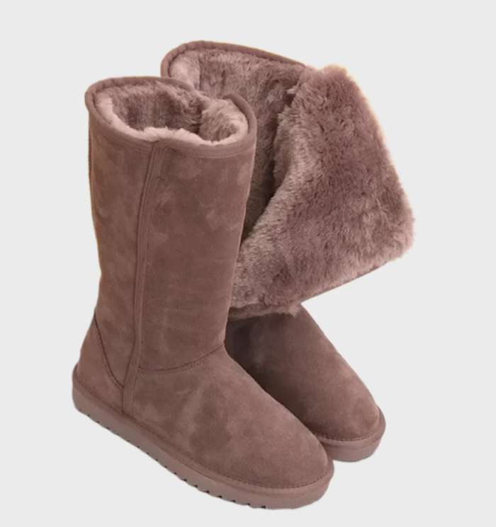 "Warme, waterdichte suède sheepskin laarzen met ritssluiting, ideaal voor herfst en winter."