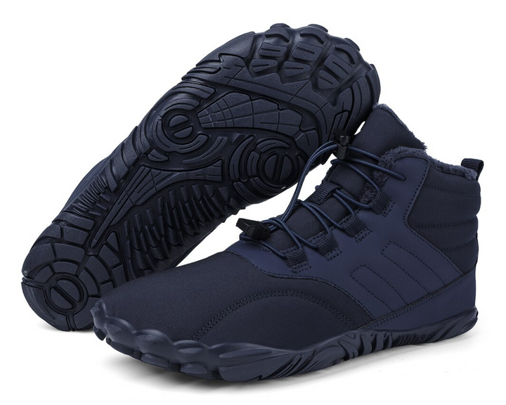 "Waterdichte ArcticBare Flex™ winter schoenen met antislip zool, ideale barefoot stijl in donkerblauwe en grijze tinten."