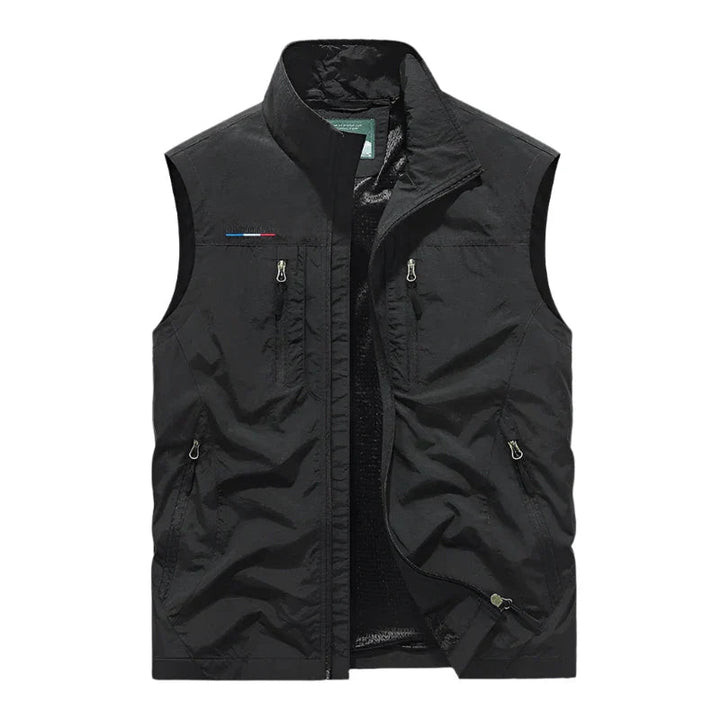 "Waterdichte heren bodywarmer met moderne pasvorm, multicolor ontwerp en functionele zakken voor buitenactiviteiten."