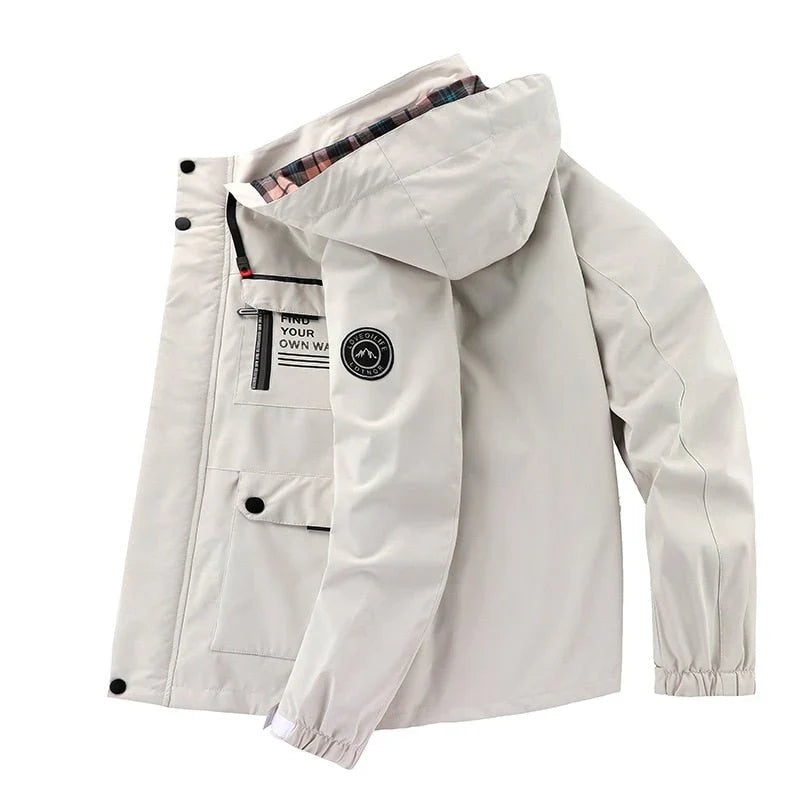 "Waterdichte tactische jas voor mannen, elegant ontwerp, ideaal voor avontuur en stijl, donkergrijs met meerdere zakken."