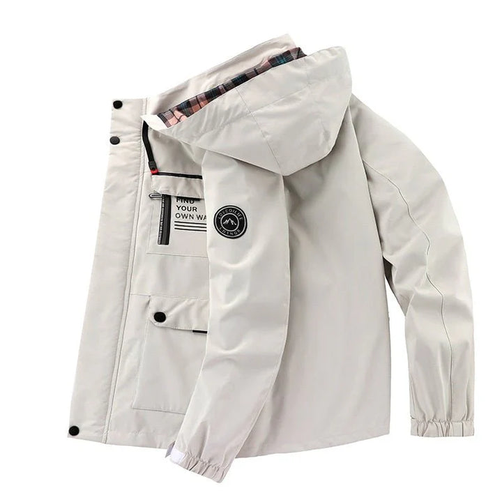 "Waterdichte tactische jas voor mannen, elegant ontwerp, ideaal voor avontuur en stijl, donkergrijs met meerdere zakken."