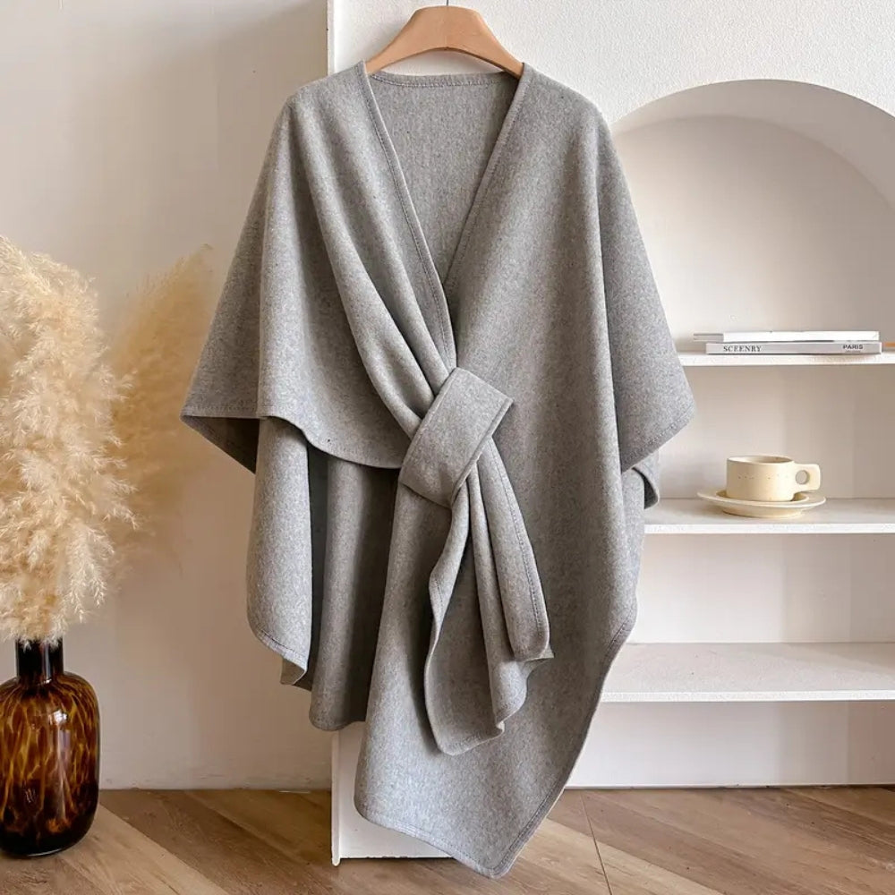 "Winddichte sjaaljas voor dames, elegant en luxe, met zachte drape en veelzijdige kleuren zoals taupe en ivoor."
