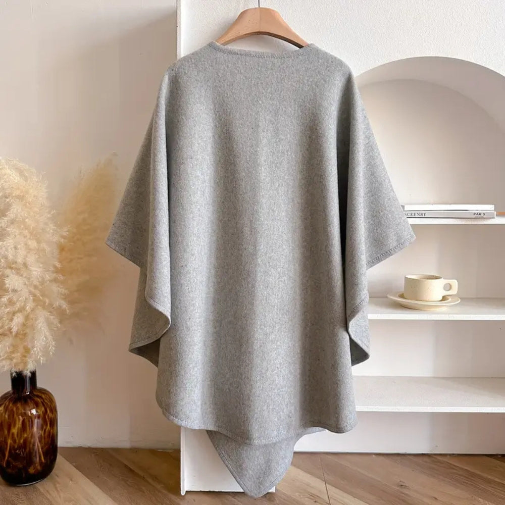 "Winddichte sjaaljas voor dames, elegant en luxe, met zachte drape en veelzijdige kleuren zoals taupe en ivoor."