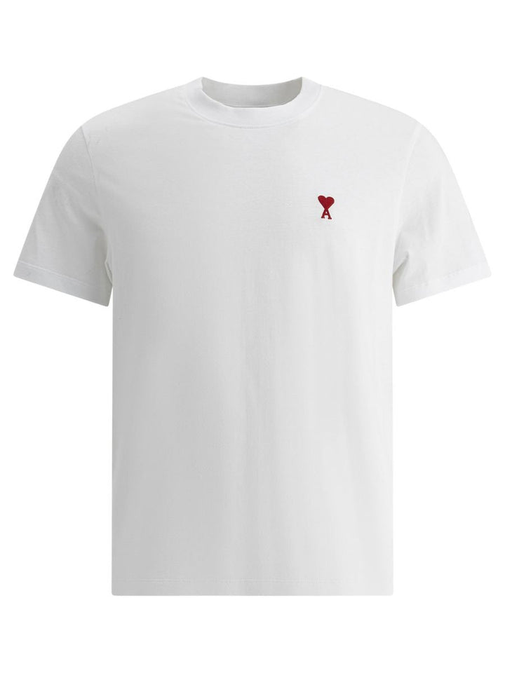 Wit heren T-shirt van 100% katoen, klassieke pasvorm, korte mouwen en minimalistisch borduurwerk voor alle gelegenheden.