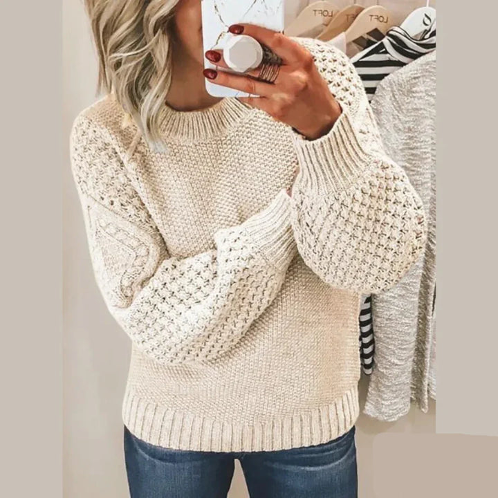 "Zachte gebreide trui voor dames, in elegante winterstijl, met comfortabele pasvorm en verfijnde textuur."