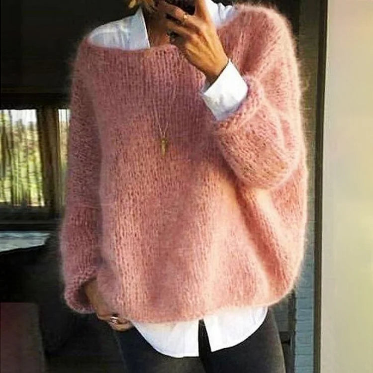 "Zachte roze oversized mohair trui, perfect voor een stijlvolle casual look. Ideaal voor vrouwen, licht en comfortabel."