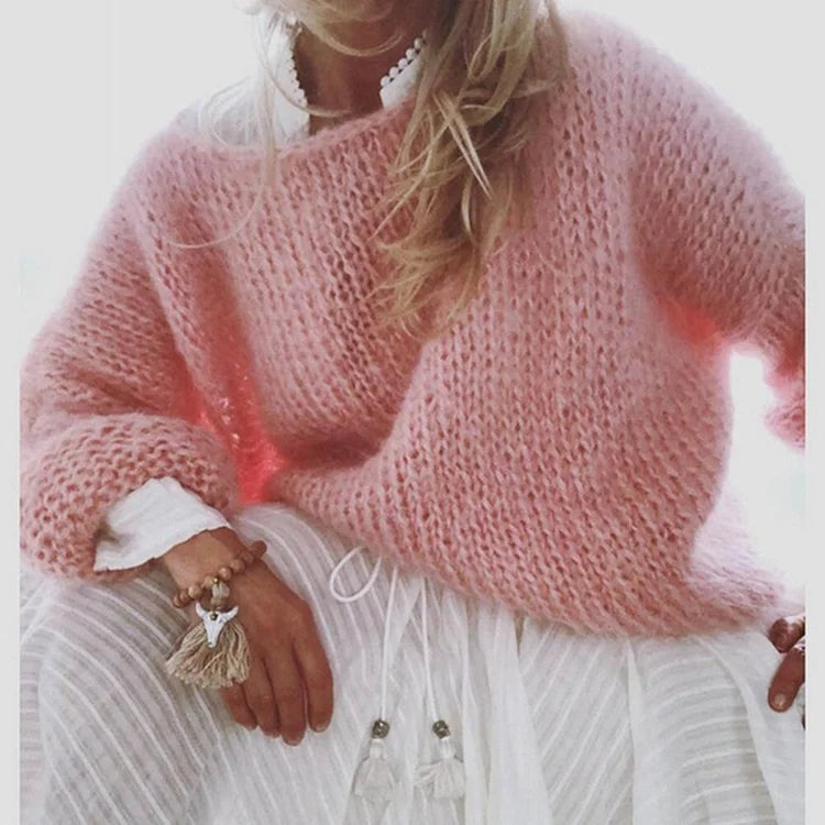 "Zachte roze oversized mohair trui, perfect voor een stijlvolle casual look. Ideaal voor vrouwen, licht en comfortabel."