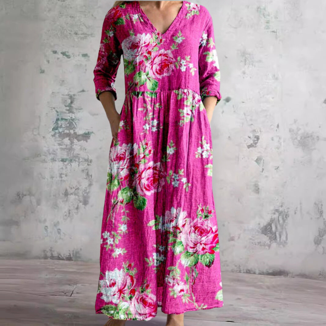 Zomerjurk met elegante V-hals en romantisch bloemenpatroon, perfect voor dames, comfortabel en luchtig voor warme dagen.