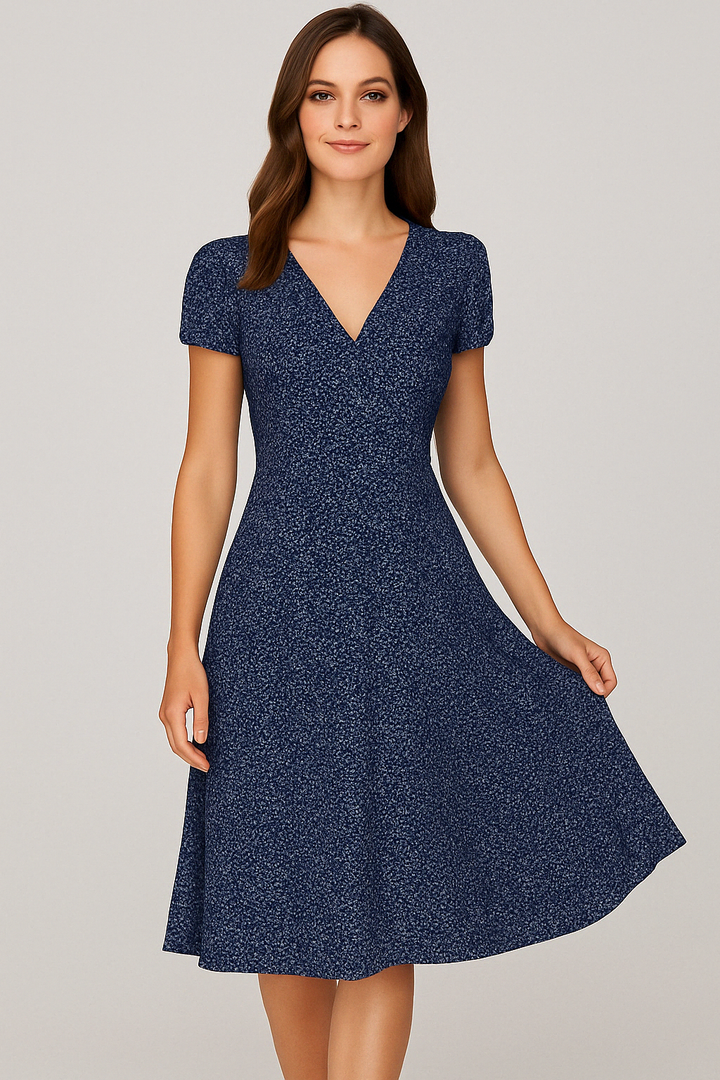 Zomerse A-lijn jurk met bloemenprint, V-hals, elegante en comfortabele pasvorm, ideaal voor zomerse dagen.