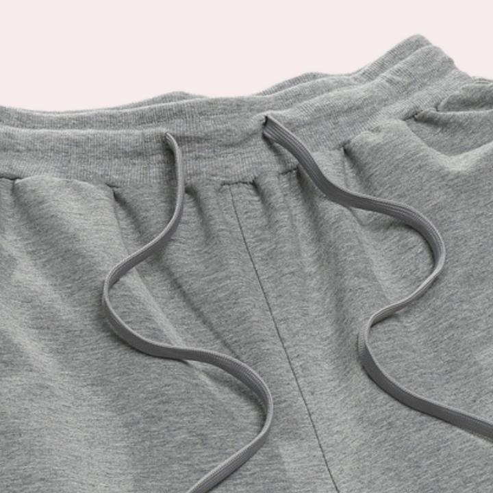 "Zomerse heren joggingbroek in oversized stijl, katoenmix, met elastische tailleband en trekkoord voor optimaal comfort."