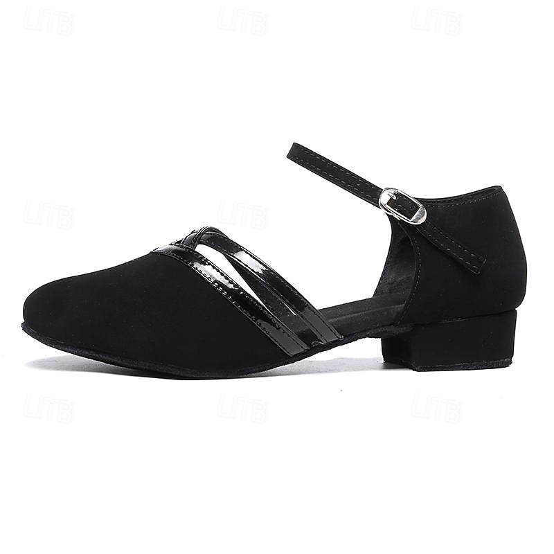 Zwarte damesschoenen met hak en enkelband, ideaal voor dansen, bieden elegante uitstraling en comfort op lichte vloer.