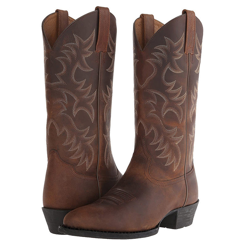 "Zwarte en bruine heren cowboylaarzen van rundleer met spitse neuzen en stijlvolle stiksels voor een klassieke western look."
