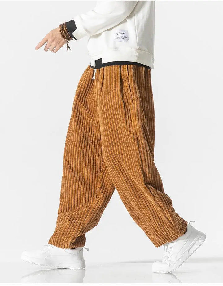 "Zwarte geribbelde relaxed fit broek, corduroy ontwerp, elastische taille, urban stijl, perfect voor casual dagen."