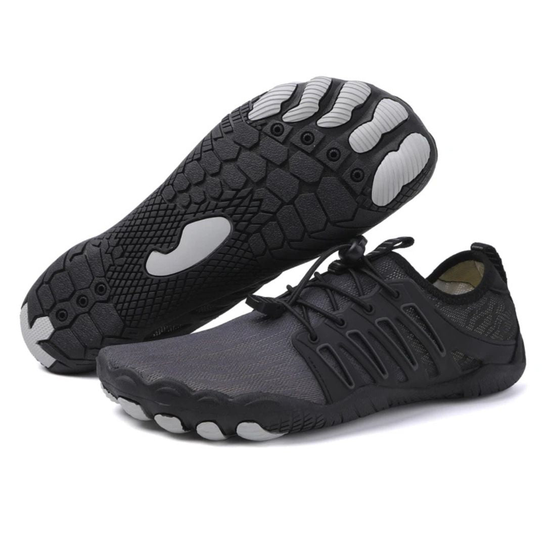 "Zwarte orthopedische barefoot schoenen voor dames, lichtgewicht en ademend, ideaal voor comfort en natuurlijke beweging."