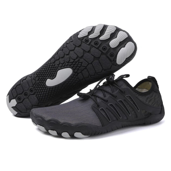 "Zwarte orthopedische barefoot schoenen voor dames, lichtgewicht en ademend, ideaal voor comfort en natuurlijke beweging."