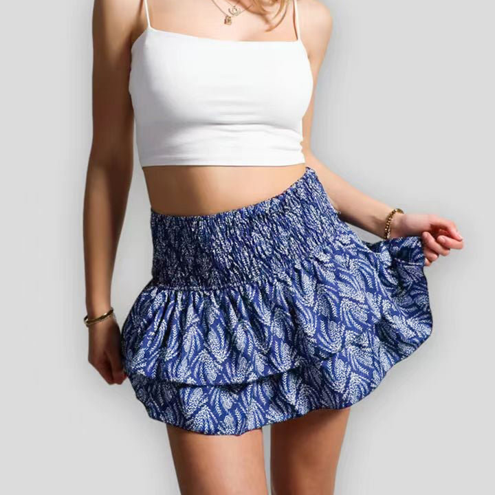 "Zwierige Livia Boho zomerrok met speelse ruffles en dromerige print, ideaal voor zomerse gelegenheden."